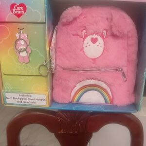 Care Bears Mini Backpack. Comes With Card Holder And Key Chain